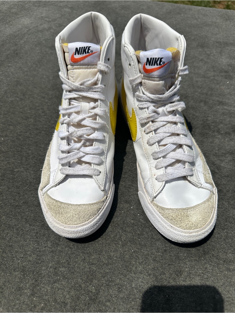 Nike White and Yellow High-Top Sneakers with Orange Swoosh